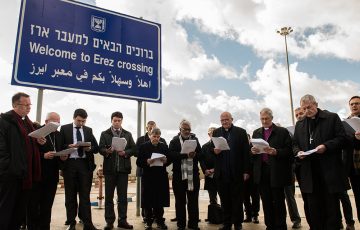 Bishops from around the world pray at the Gaza/Israel border